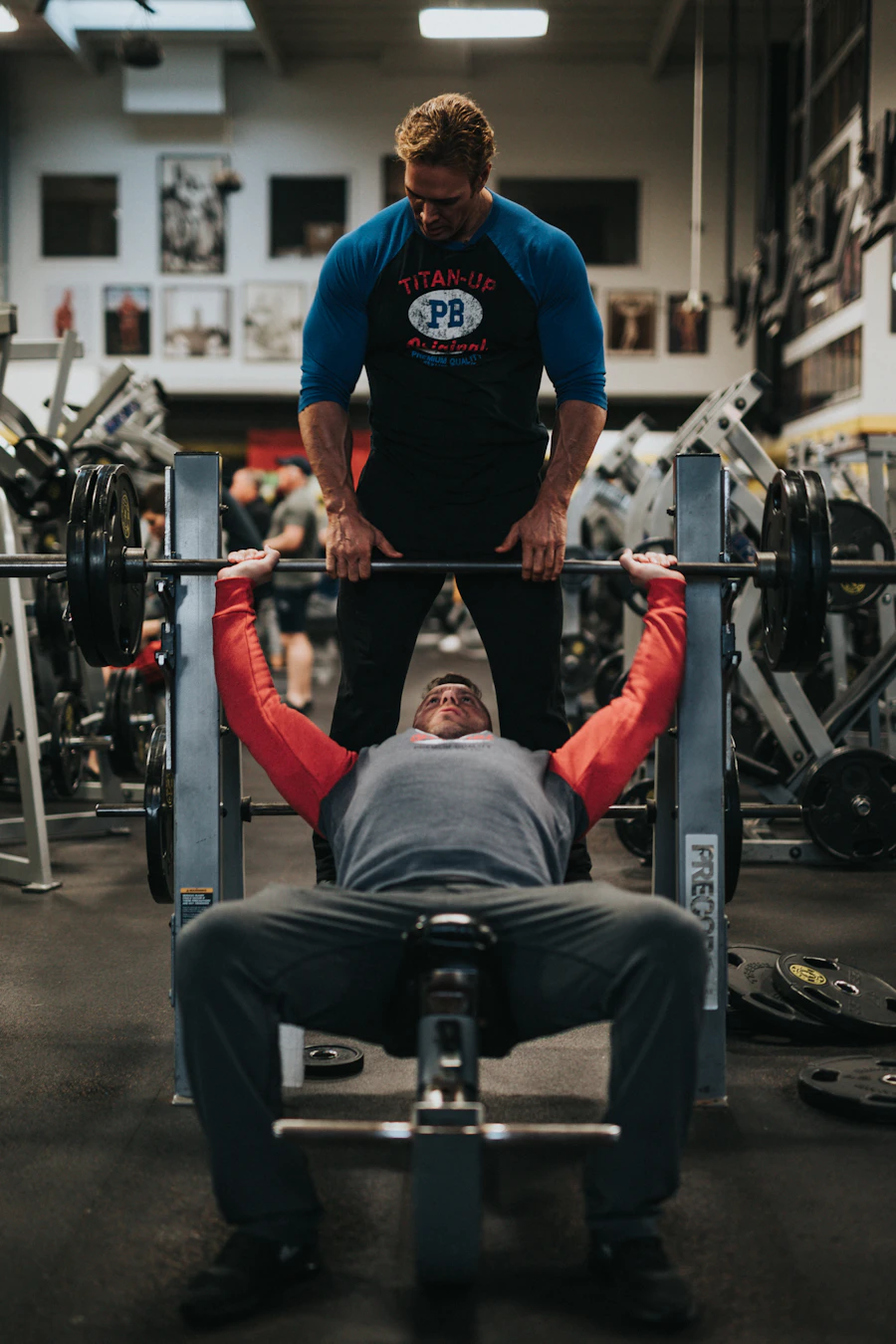 Rowan spotting a client on the bench press